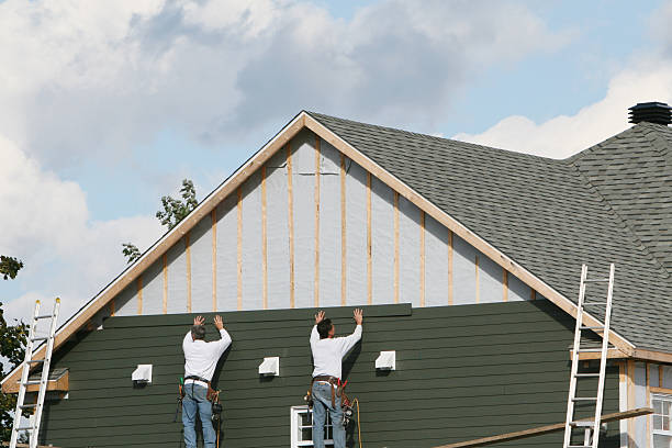 Professional Siding Contractor technician working in Adamstown, PA